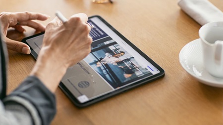 man looking at computer to integrate service